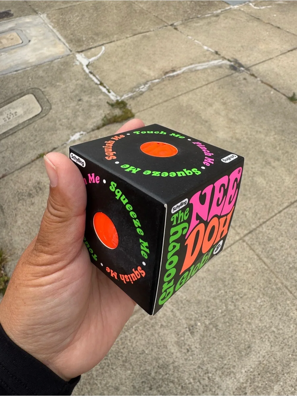The Nee Doh Groovy Glob! Stress Ball Toy - Pink & Orange